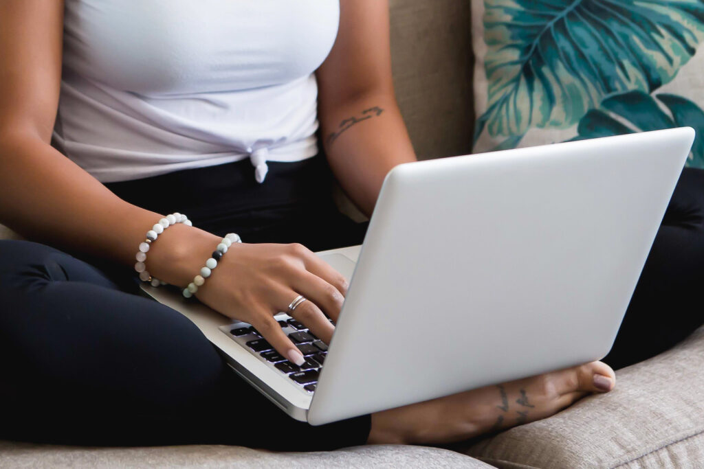 Person working on laptop at home